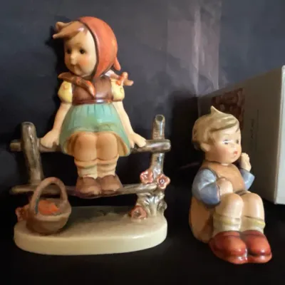 Lot with a boy and a girl hummel figurines