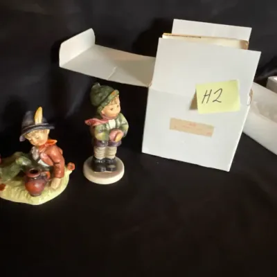Two boy hummel figurines