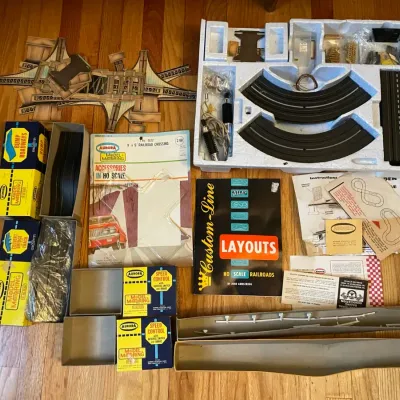 1960s set of aurora model motoring racing tracks