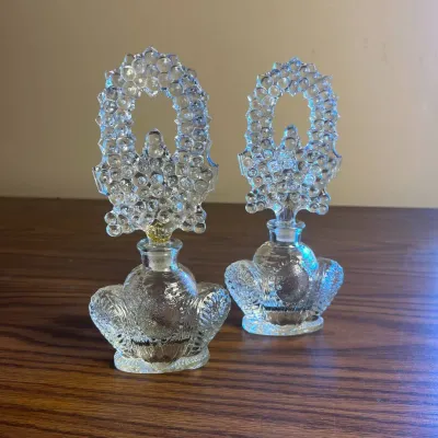 p Pair of Intricately Designed Clear Glass Perfume Bottles with Decorative Hobnail Stoppers .jpg