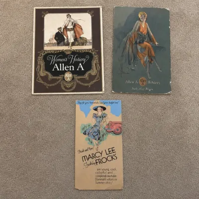ar Collection of 3 fashion advertising display boards featuring 2 Allen-A Hosiery ads and one Marcy Lee Fashion FrocksCollection of 3...