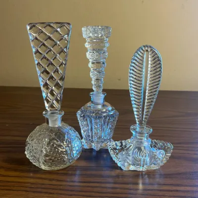 p Set of Three Vintage Decorative Glass Perfume Bottles with Intricate Elongated Stoppers H- 7.5in and 6.5in .jpg