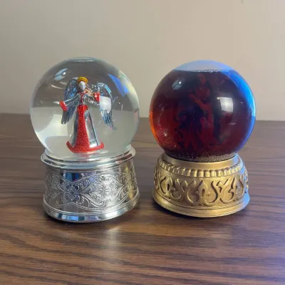 K set of two angel themed music box snow globes