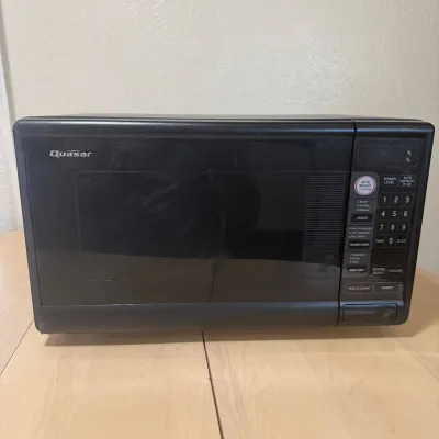 hk Quasar Black Microwave Oven with Digital Controls and Compact Design.jpg