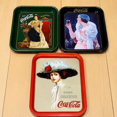 c6 Set of Three Coca-Cola Serving Trays Featuring Classic Early 20th Century Advertisements.jpg