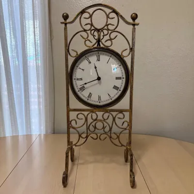 ld Antiqued Gold Mist Wrought Iron Quartz Mantel Clock with Suspended Analog Dial.jpg