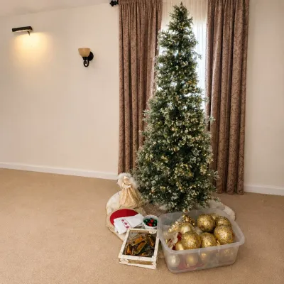 h Pre-lit Flocked Artificial Christmas Tree with Gold Ornament Set and Decorative Accents .jpg