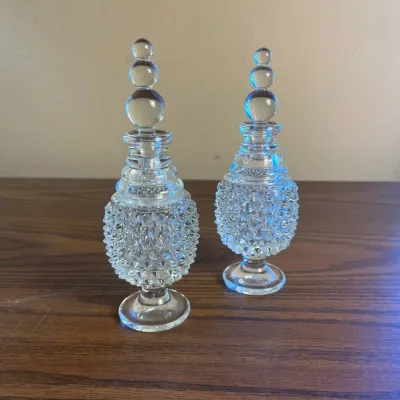 P pair of vintage clear glass hobnail perfume bottles with stoppers