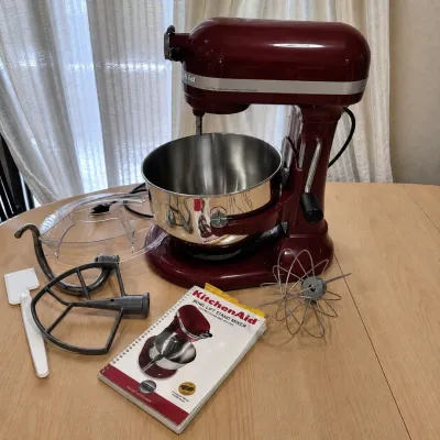 A5 kitchenaid stand mixer with multiple attachments and recipe book