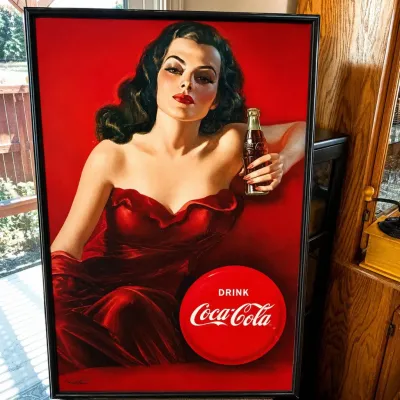 C28 coca cola framed poster featuring elegant woman in red