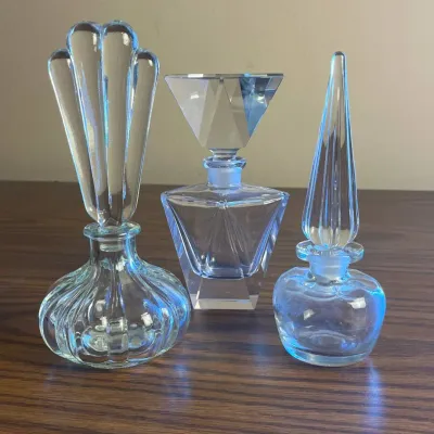 p Set of Three Vintage Clear Glass Geometric Decorative Perfume Bottles with Stoppers H- 7.5in, 7in, and 6in.jpg