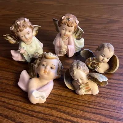 K set of five angel figurines with pastel colors and detailed features