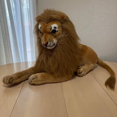 Ld large plush lion with realistic mane and detailed features