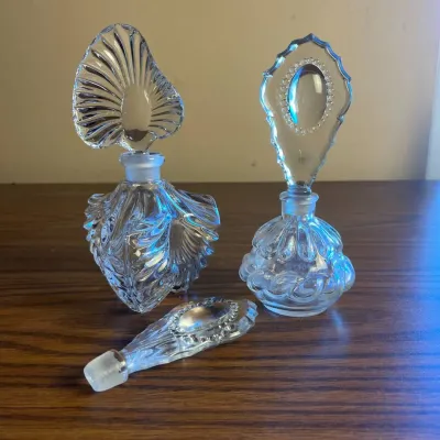 p Vintage Cut Glass Perfume Bottles with Intricately Designed Stoppers H- 7.5in, 7in, and 4.5in .jpg
