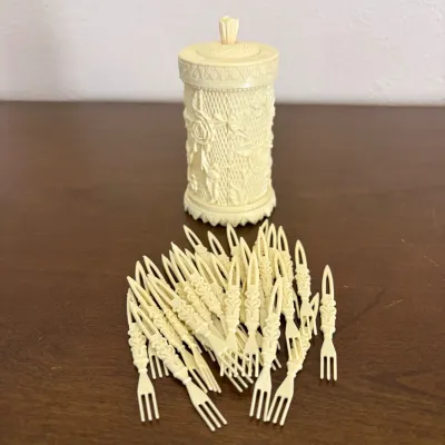 hd Mid Century Faux Ivory Plastic Cocktail Fork Set with Ornate Carrier, Made in Hong Kong.jpghd 