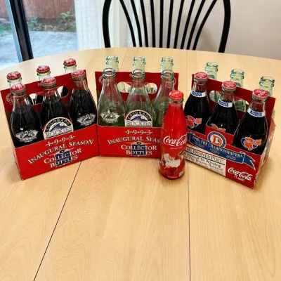 c1 Collection of 19 Coca-Cola Glass Bottles Featuring 8oz Sports-Themed Bottles .jpg