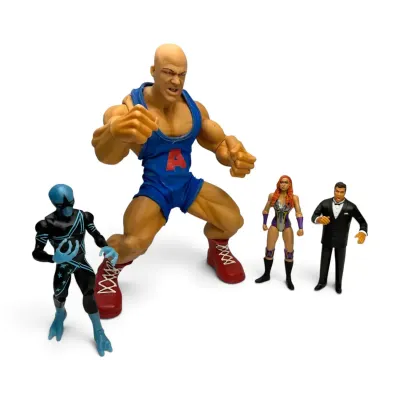 WWE Wresting Figurines; 14” Kurt Angle, Mutants Stardust Cody Rhodes, Becky Lynch, & Michael Buffer