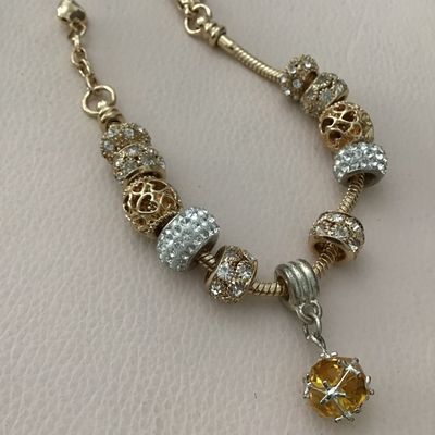 Cute gold tone bracelets charm