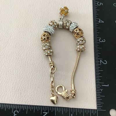 Cute gold tone bracelets charm