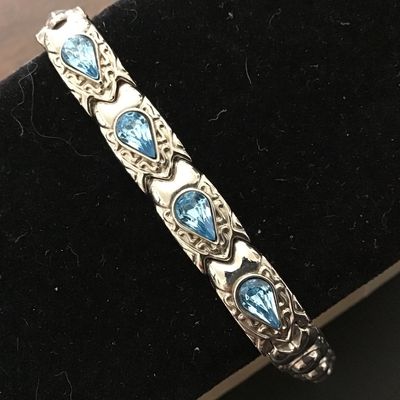 Nice Quality Blue Tear Drop Center Stones Set in Silver Tone flip over Clasp