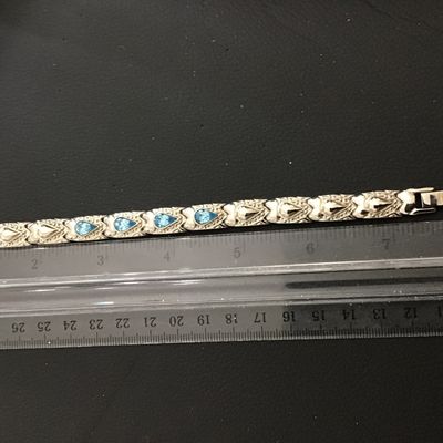 Nice Quality Blue Tear Drop Center Stones Set in Silver Tone flip over Clasp