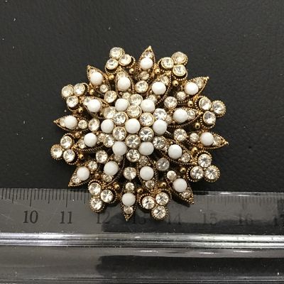 White Glass Rhinestone in Gold Tone Starburst Vintage Brooch