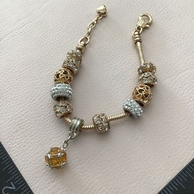 Cute gold tone bracelets charm
