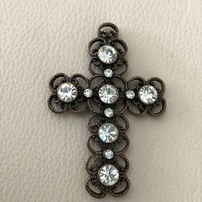 Beautiful copper, toned, intricate design, cross pendant