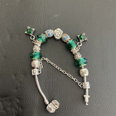 Beautiful pandora style bracelet with green glass beads with 925 markings