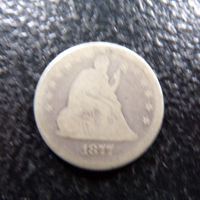 1877 SEATED LIBERTY SILVER QUARTER