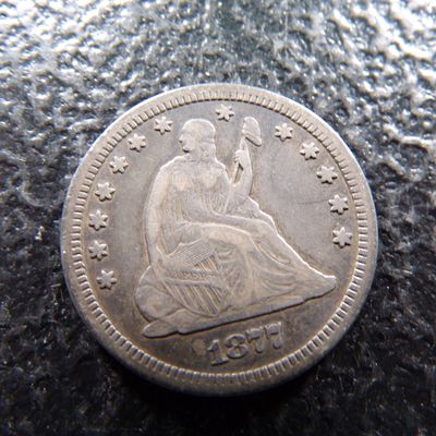 1877-CC CARSON CITY SEATED LIBERTY SILVER QUARTER