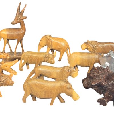 A Set of Twelve Hand Carved African Wooden Safari Animal Figurines