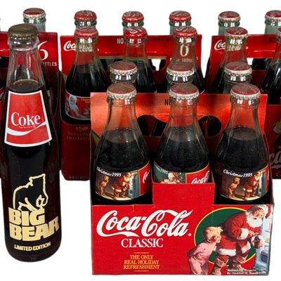 A Collection of Vintage Coca-Cola Holiday Santa Pack Commemorative Bottle Sets and Big Bear Anniversary Bottle