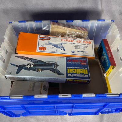 An Assortment of Model Aircraft Kits, Model Railroad Accessories, and Novelty Toys