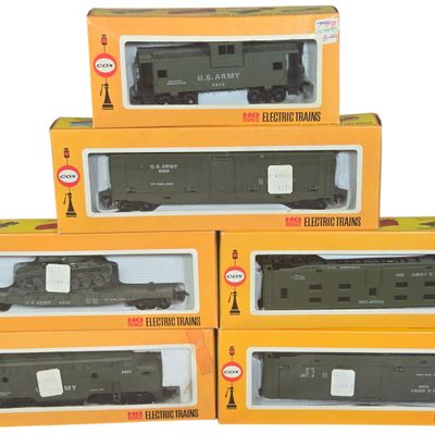A Six-Piece Collection of Cox HO Scale U.S. Army Military Model Trains in Original Boxes