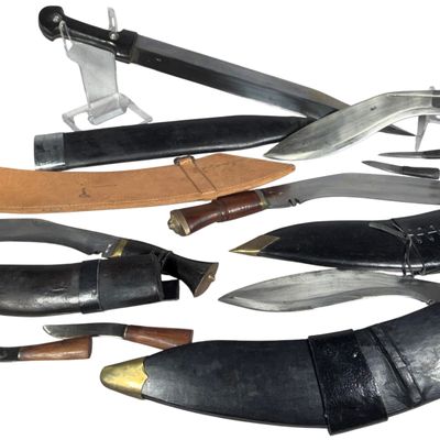 A Collection of Gurkha Khukuri Knives and a Caucasian Kindjal Dagger