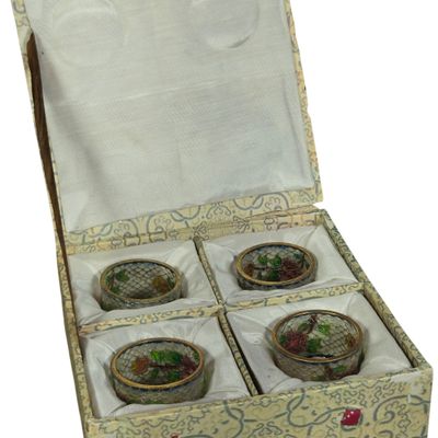 A Set of Four Chinese Plique-à-Jour Enamel Napkin Rings in Presentation Box