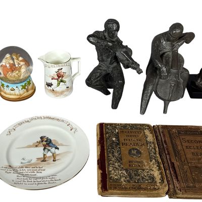 A Collection of McGuffey's Eclectic Readers, Nursery Rhyme Themed Porcelain, and Modernist Sculptures
