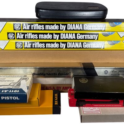 A Collection of 23 Pieces of Empty Original Factory Firearm Packaging and Cases