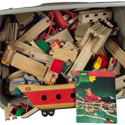 A Collection of Vintage Brio Wooden Train Set Components and Accessories Including 1988 Catalog