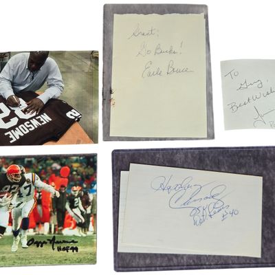 A Collection of Five Hand-Signed American Football Memorabilia Items Including Ozzie Newsome and Earle Bruce