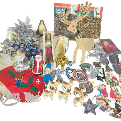 A Collection of Vintage Christmas Ornaments and Holiday Decorations Including Santa Land and Noma