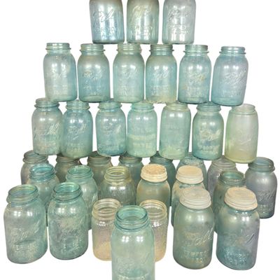 A Collection of 27 Vintage Aqua and Clear Glass Canning Jars Including Ball and Atlas