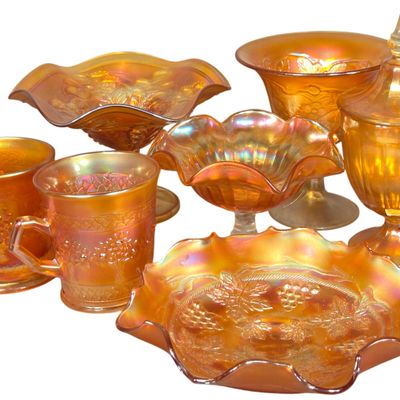 A Collection of 7 Pieces of Marigold Carnival Glass Including Imperial Grape and Orange Tree Patterns