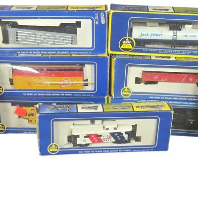 A Collection of Eleven AHM HO Scale Model Locomotives and Rolling Stock in Original Boxes