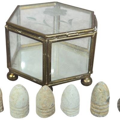 An Assortment of American Civil War Excavated Lead Projectiles in a Decorative Glass Display Case