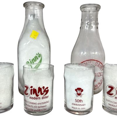 A Collection of Zinn's Dairy and Zinn's Modern Diner Glassware