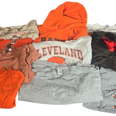 A Collection of 11 Pieces of Cleveland Browns Fan Apparel Including Nike and Starter