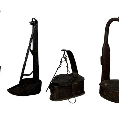 A Collection of Eighteenth and Nineteenth Century Wrought Iron and Tin Lighting Devices
