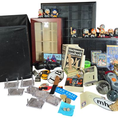 A Collection of Sports Memorabilia, Historical Artifacts, Display Cases, and Media